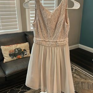 Like new cute dress. Cream size 0